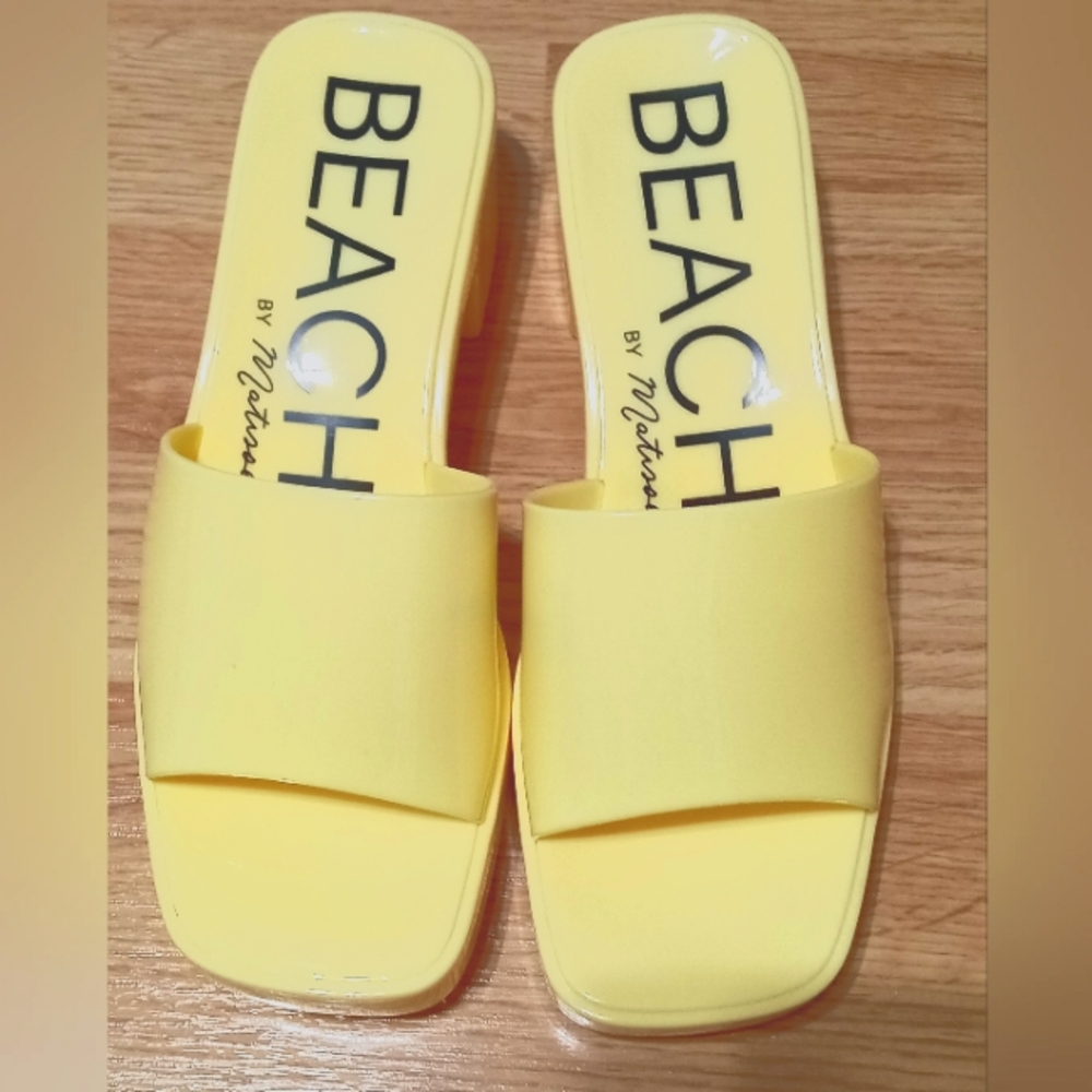 Beach brand plastic sandals. Yellow. Size 7. EUC.